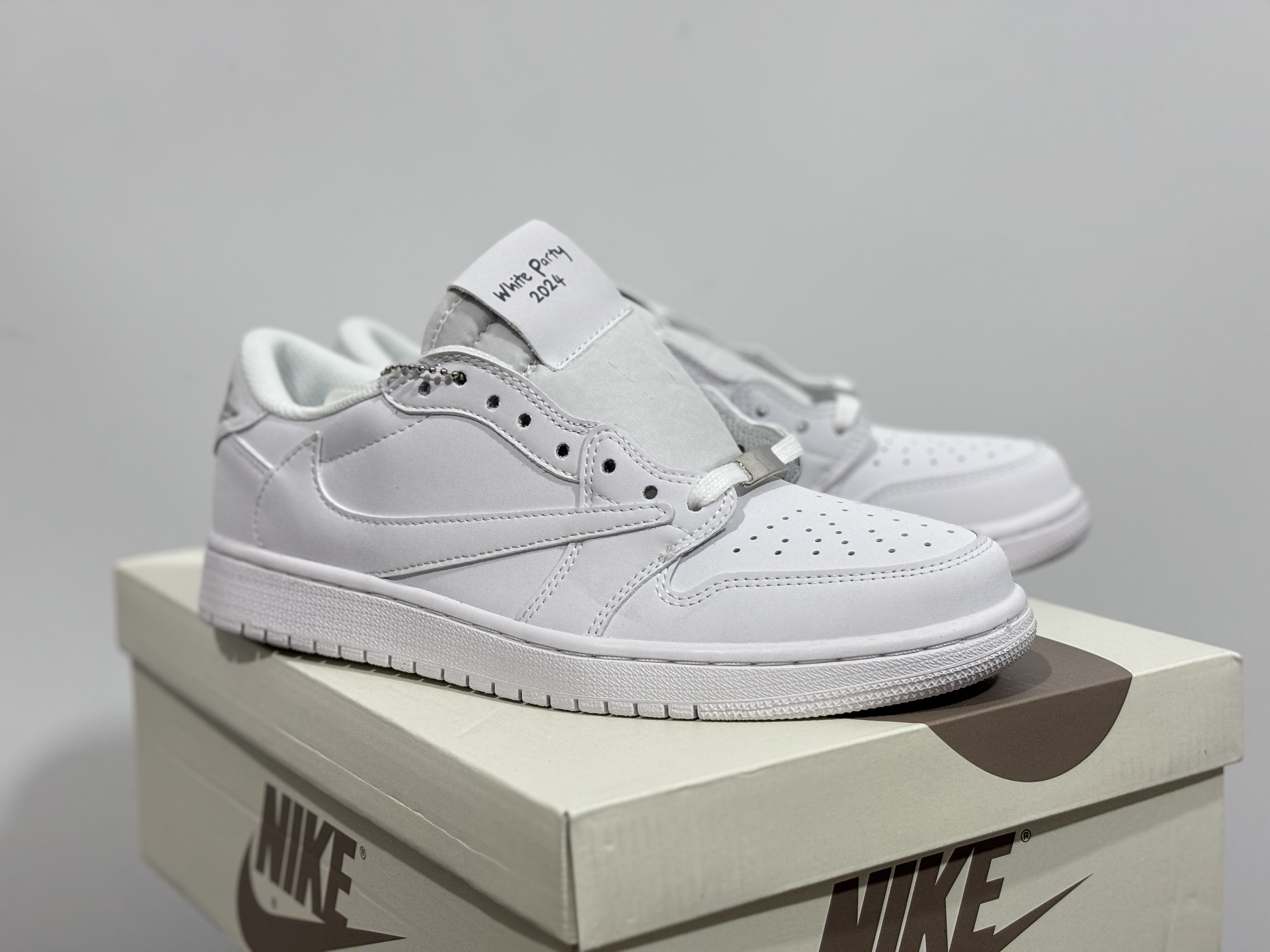 Travis Scott x Air Jordan 1 Low white party